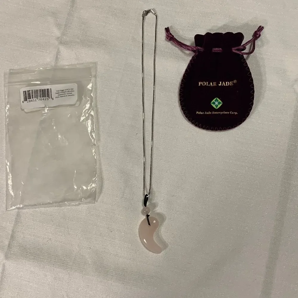 Polar Jade silvertone angel wing necklace. NWT
